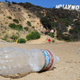 Empty water bottles litter the ground at a popular Hollywood sign viewing area.